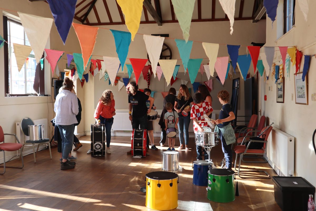 Samba class in cheerful bunting-clad hall