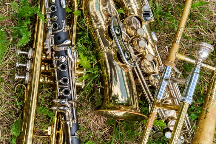 Saxaphones lying on grass